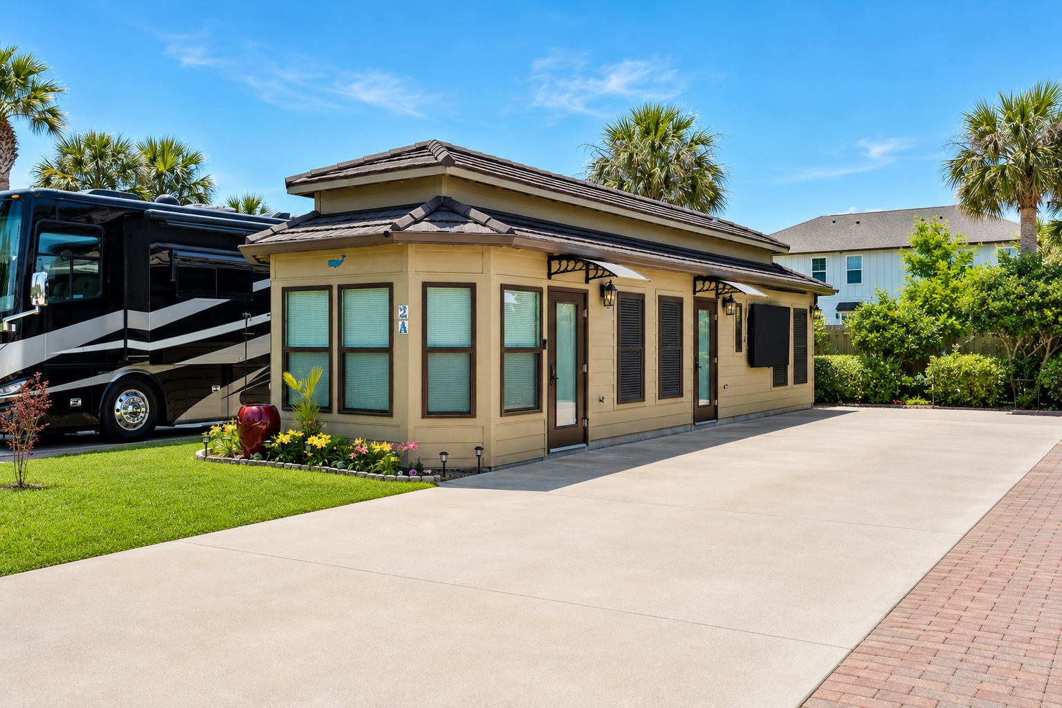 Lot 2A coach house with Class A motor coach — Terry Cove Motor Coach Resort for sale