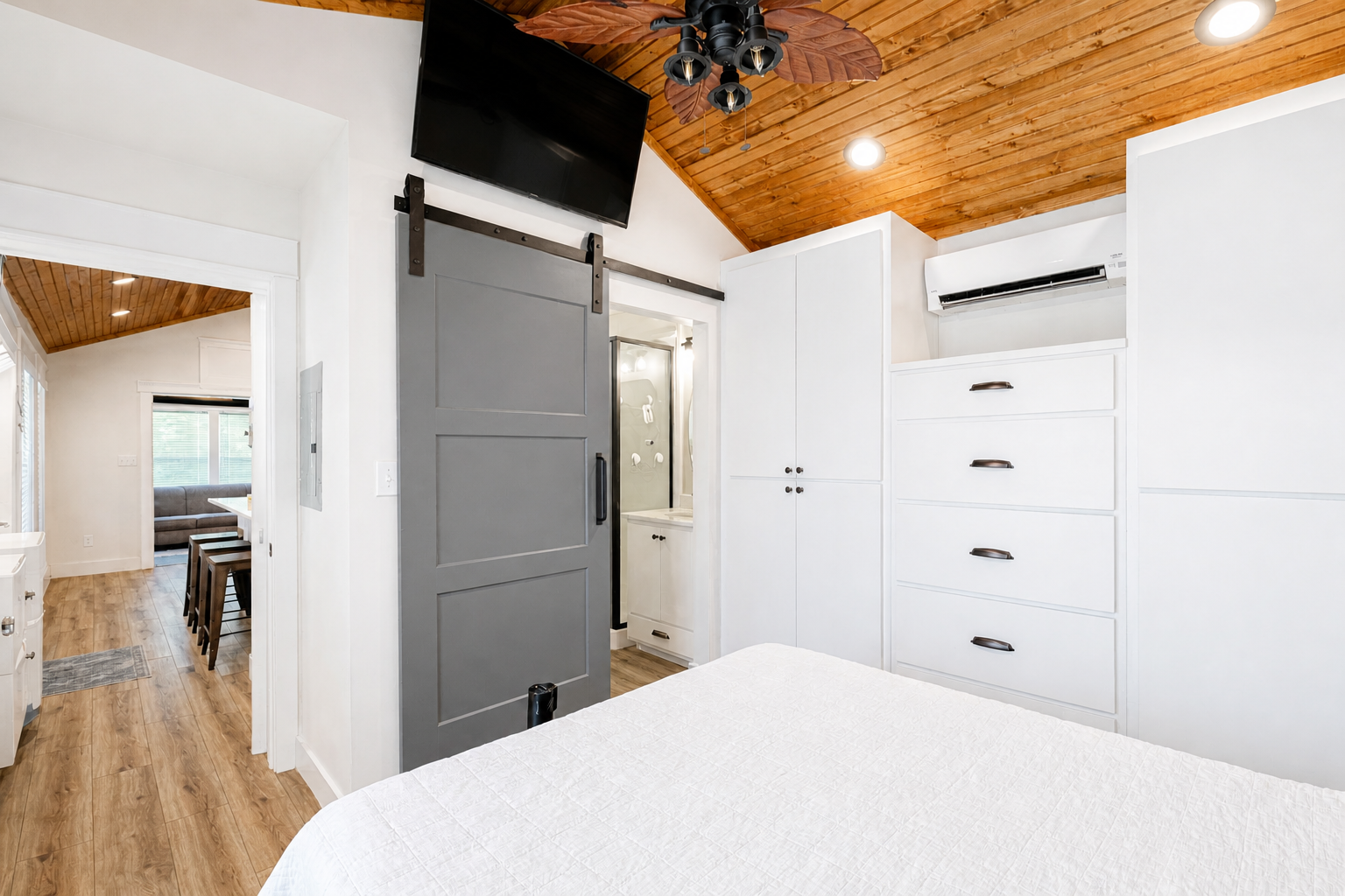 Private bedroom inside Lot 2A coach house at Terry Cove Motor Coach Resort